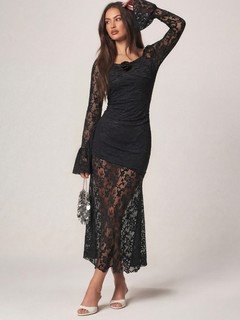 Styled front view of the black floral lace long-sleeve maxi dress, showing its silhouette and design details.