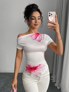 Front fit view of the white and pink floral one-shoulder fitted top, showing its silhouette and design details.