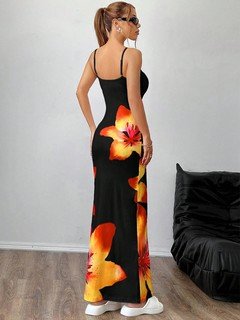 Back view of the black and orange floral bodycon maxi slip dress, showing its silhouette and design details.