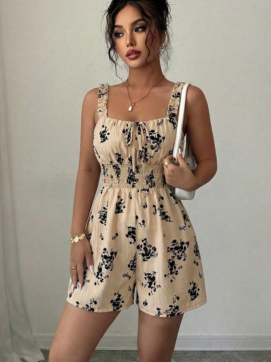 Cream Floral Smocked Ruffle-Strap Romper – Front View Front view of the cream floral smocked ruffle-strap romper, showing its silhouette and design details.