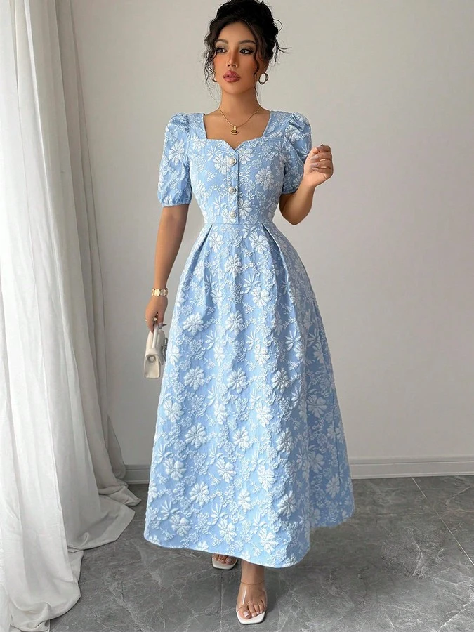 Front view of the blue floral puff-sleeve a-line dress, showing its silhouette and design details.