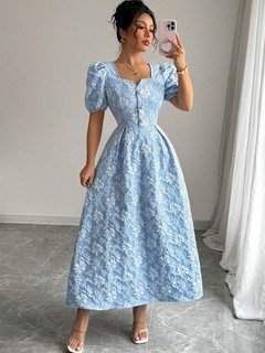 Styled front view of the blue floral puff-sleeve a-line dress, showing its silhouette and design details.