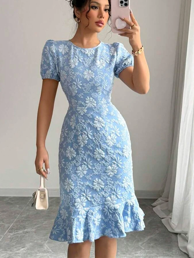 Front view of the blue floral textured fishtail dress, showing its silhouette and design details.