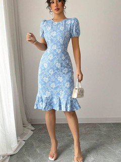 Styled front view of the blue floral textured fishtail dress, showing its silhouette and design details.