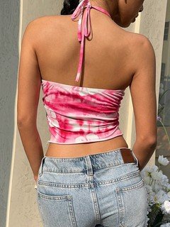 Back view of the pink hibiscus ruched halter crop top, showing its silhouette and design details.
