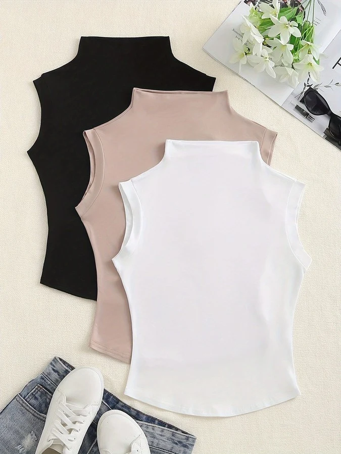 Assorted flat lay of the assorted colors high-neck sleeveless fitted tank top, showing the garment shape and available styling.