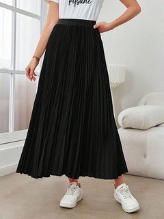 Front view of the black accordion-pleated maxi skirt, showing its silhouette and design details.