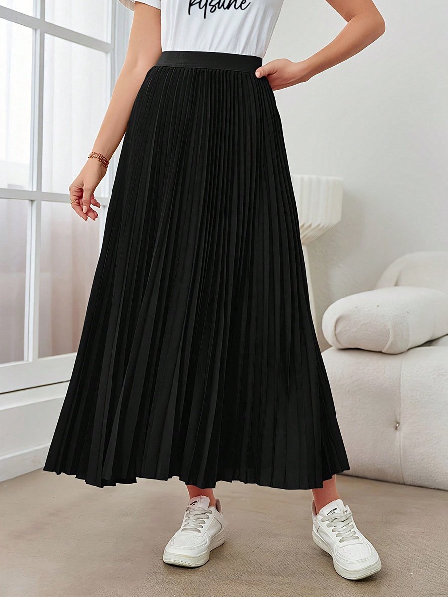 Front view of the black accordion-pleated maxi skirt, showing its silhouette and design details.