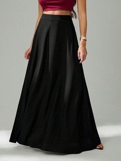 Full-length front view of the black pleated a-line maxi skirt, showing its silhouette and design details.