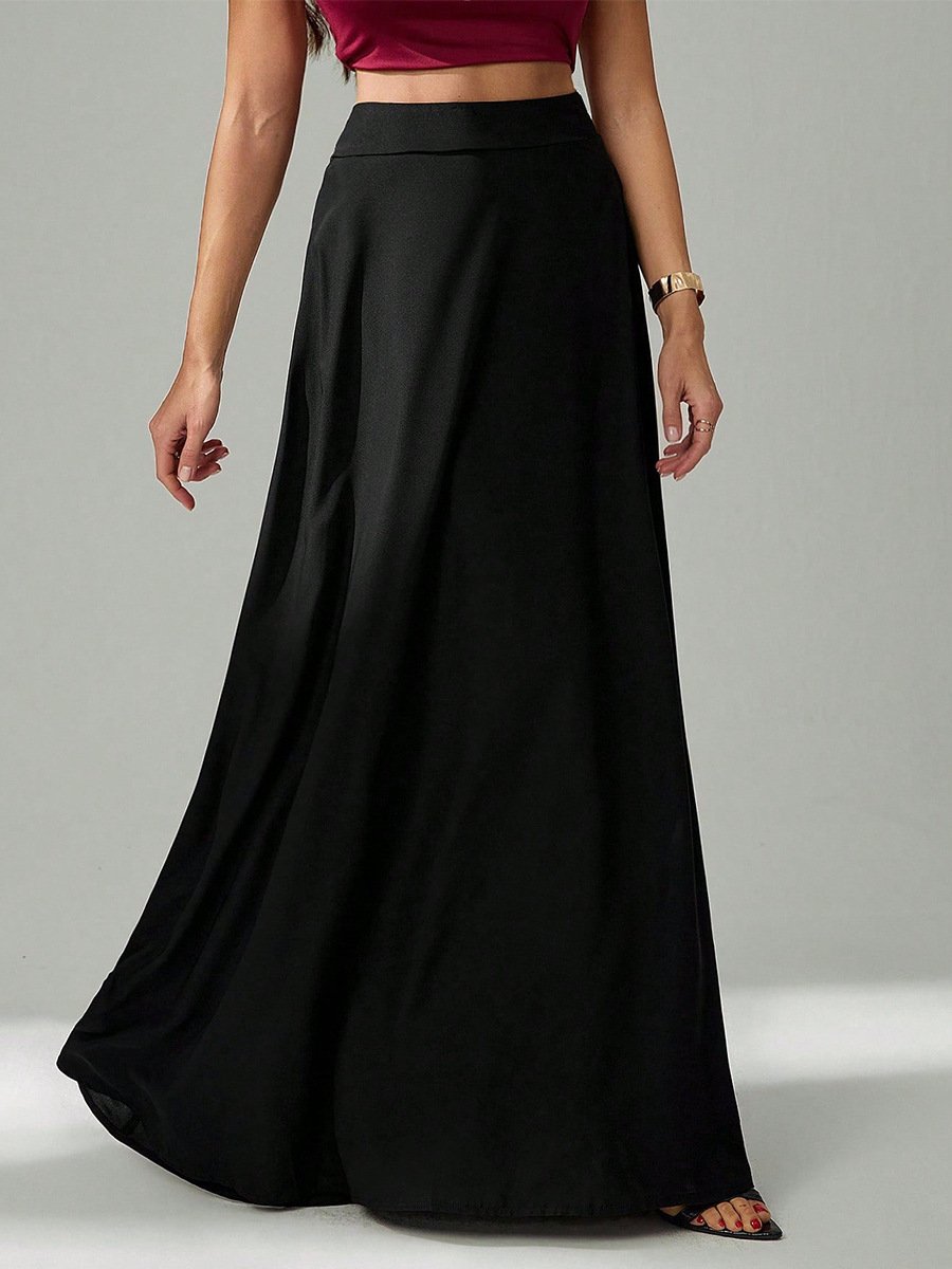 Black Pleated A-Line Maxi Skirt – Front View Front view of the black pleated a-line maxi skirt, showing its silhouette and design details.