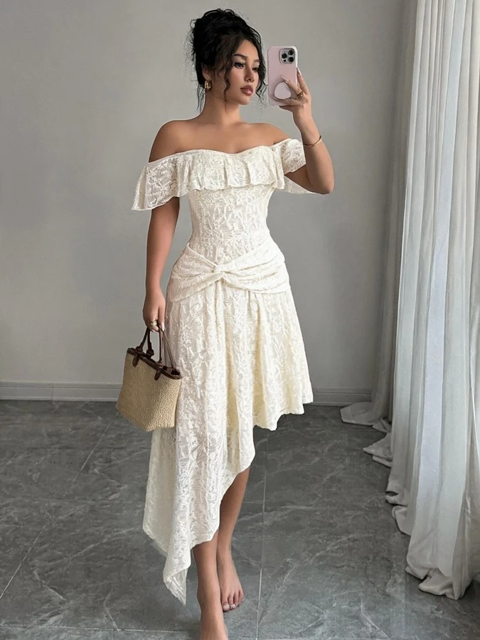Full length front view of the white lace off-shoulder asymmetric midi dress, showing the silhouette and fit.