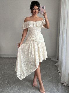 Angled front view of the white lace off-shoulder asymmetric midi dress, showing the silhouette and fit.