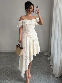 Full length front view of the white lace off-shoulder asymmetric midi dress, showing the silhouette and fit.