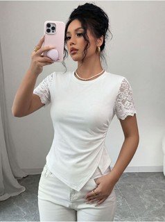 Front view of the white lace-sleeve crew-neck short-sleeve top, showing the silhouette and fit.
