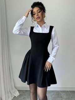 Full length front view of the black layering square-neck sleeveless skater mini dress, showing the silhouette and fit.