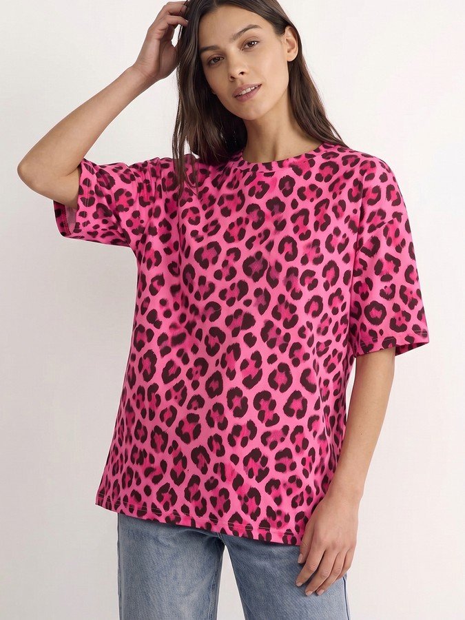 Front view of the pink leopard oversized crew-neck tee, showing its silhouette and design details.