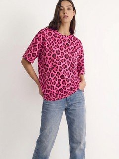 Full-length front view of the pink leopard oversized crew-neck tee, showing its silhouette and design details.