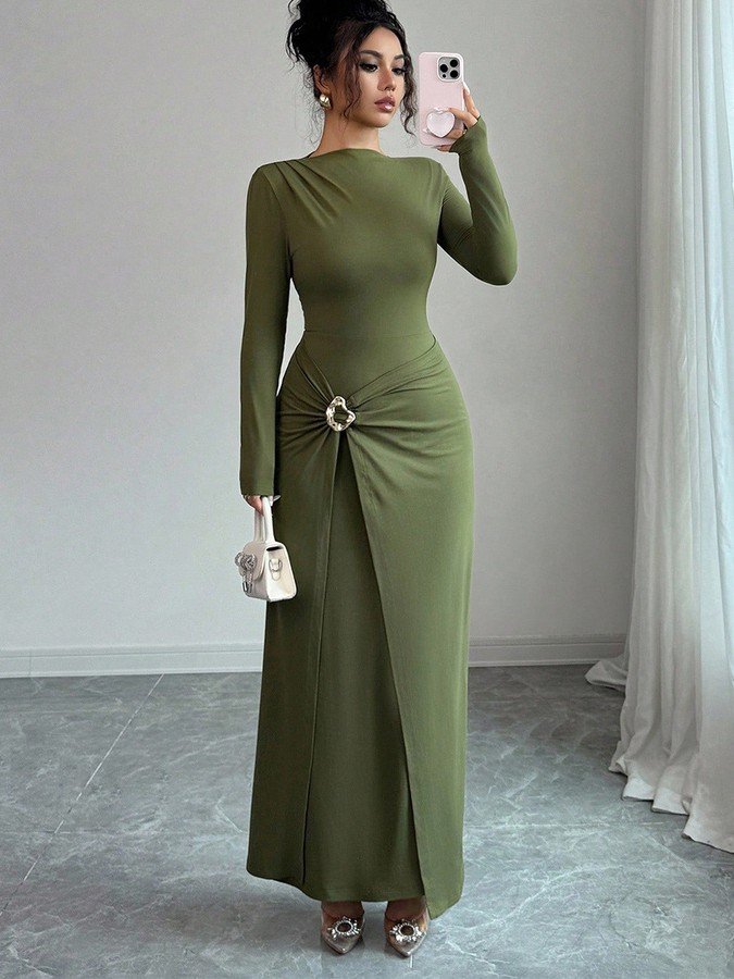 Angled front view of the olive green buckle-waist long-sleeve dress, showing its silhouette and design details.