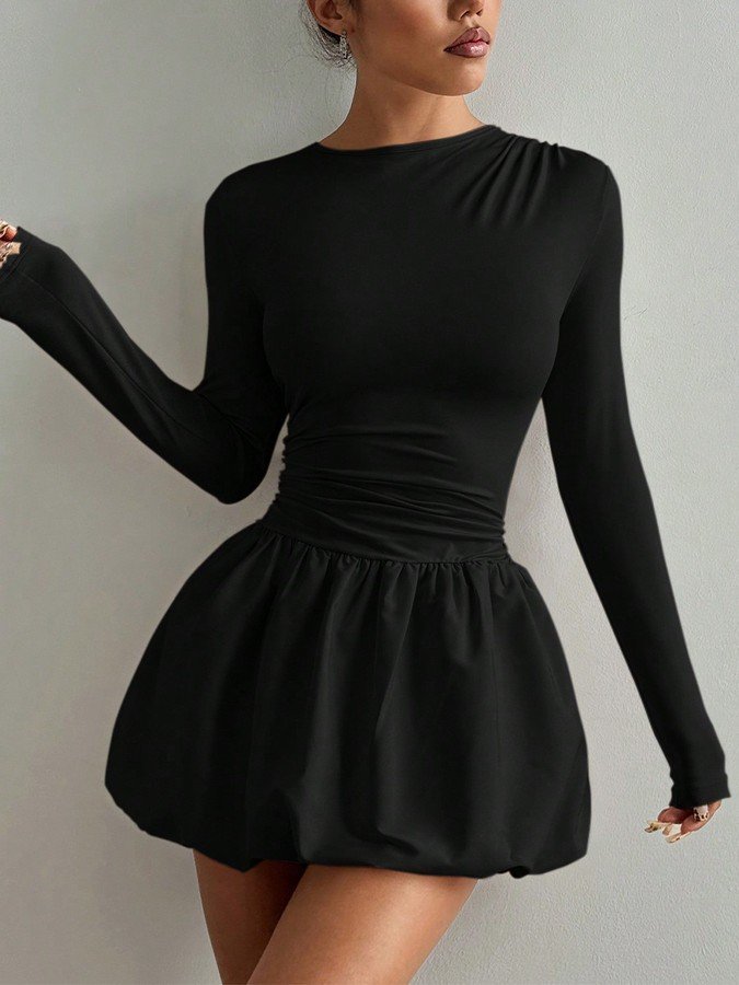 Front view of the black long-sleeve bubble hem dress, showing its silhouette and design details.