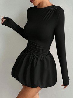 Full-length front view of the black long-sleeve bubble hem dress, showing its silhouette and design details.