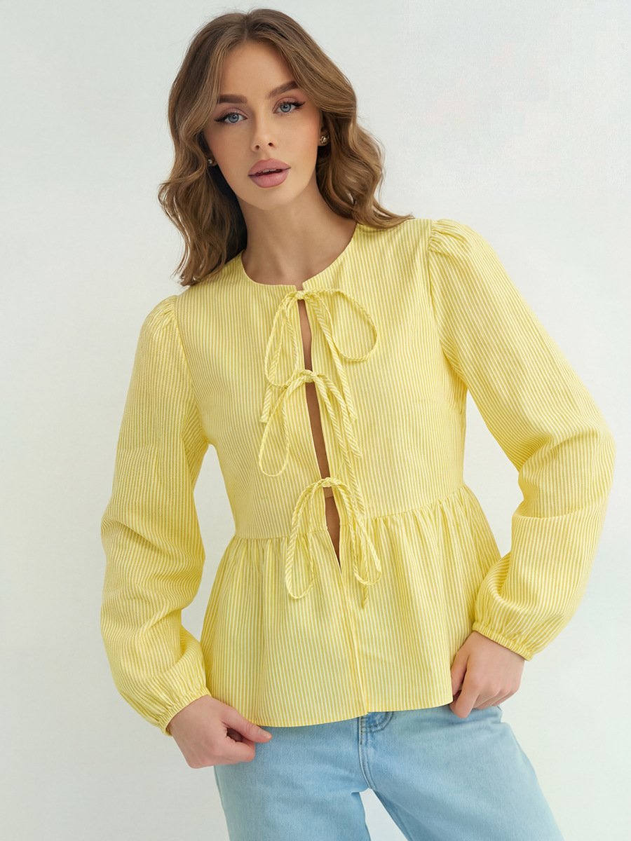 Yellow Tie-Front Long-Sleeve Blouse – Front View Front view of the yellow tie-front long-sleeve blouse, showing its silhouette and design details.