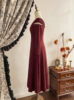 Mannequin front view of the burgundy off-shoulder pleated a-line midi dress, showing the silhouette and fit.