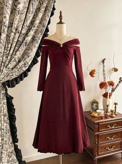 Mannequin front view of the burgundy off-shoulder pleated a-line midi dress, showing the silhouette and fit.