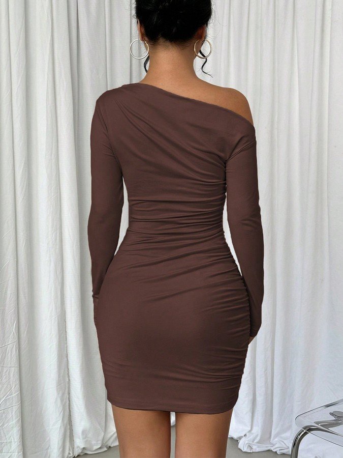 Back view of the brown one-shoulder ruched mini dress, showing its silhouette and design details.