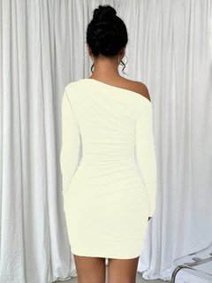 Back view of the ivory one-shoulder ruched mini dress, showing its silhouette and design details.