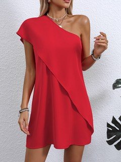 Styled front view of the red one-shoulder overlay mini dress, showing its silhouette and design details.