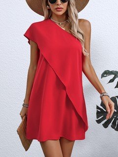 Three-quarter front view of the red one-shoulder overlay mini dress, showing its silhouette and design details.