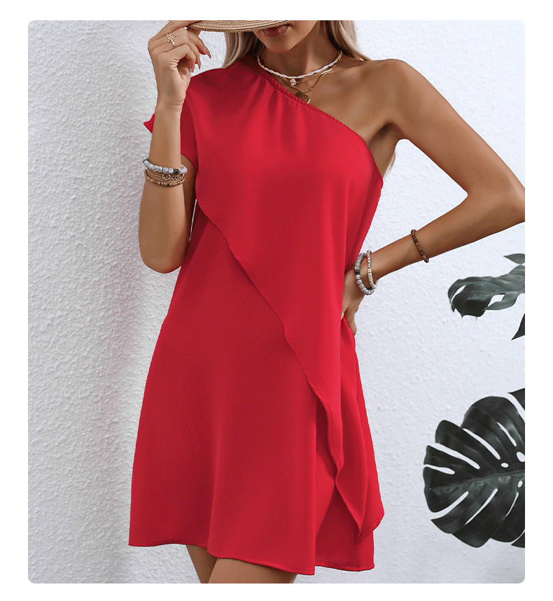Red One-Shoulder Overlay Mini Dress – Front View Front view of the red one-shoulder overlay mini dress, showing its silhouette and design details.