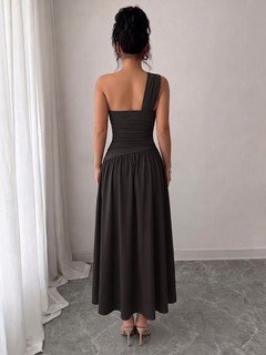 Full length front view of the black one-shoulder pleated a-line midi dress, showing the silhouette and fit.