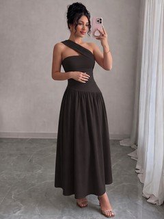 Model front view of the black one-shoulder pleated a-line midi dress, showing the silhouette and fit.