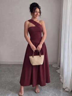 Model front view of the burgundy one-shoulder pleated a-line midi dress, showing the silhouette and fit.