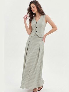 Alternate front view of the light gray pinstripe vest and maxi skirt set, showing its silhouette and design details.