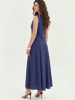 Angled back view of the navy pinstripe vest and maxi skirt set, showing its silhouette and design details.