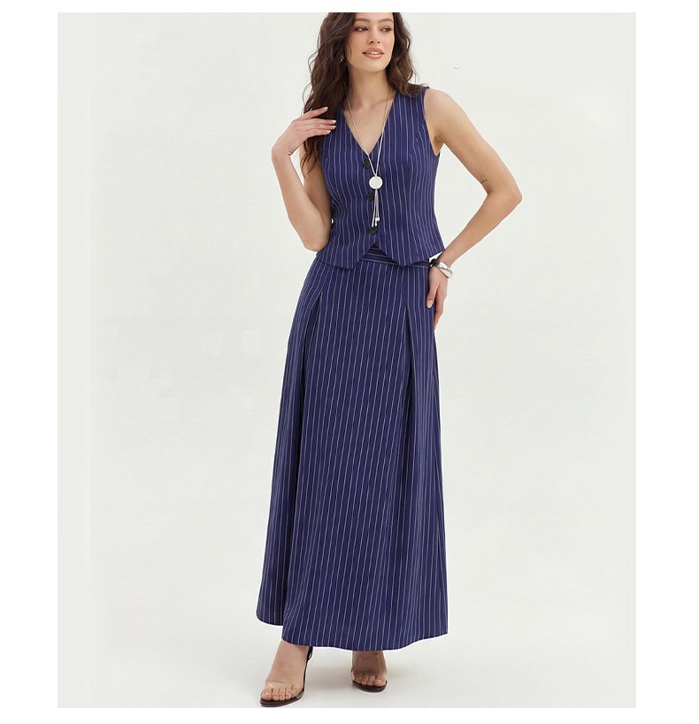 Navy Pinstripe Vest and Maxi Skirt Set – Front View Front view of the navy pinstripe vest and maxi skirt set, showing its silhouette and design details.
