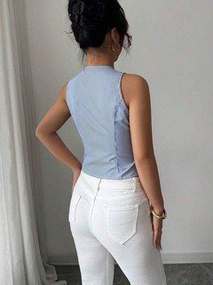 Back view of the blue pinstripe button-front vest, showing its silhouette and design details.
