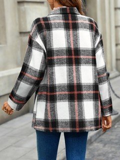 Back view of the black and white plaid flap-pocket shirt jacket, showing its silhouette and design details.