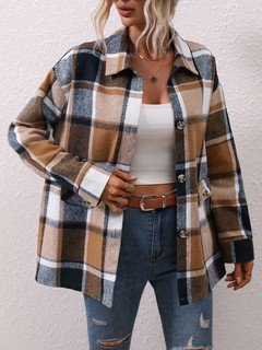 Angled front view of the brown plaid flap-pocket shirt jacket, showing its silhouette and design details.