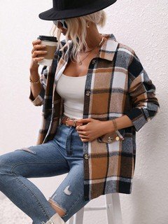 Front view of the brown plaid flap-pocket shirt jacket, showing its silhouette and design details.