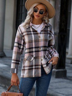 Angled front view of the pink plaid flap-pocket shirt jacket, showing its silhouette and design details.