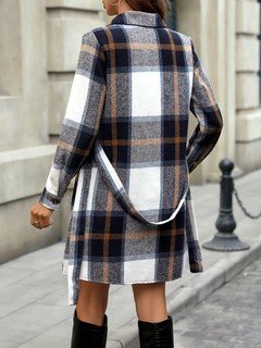 Back view of the navy plaid belted shirt dress, showing its silhouette and design details.