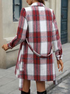Back view of the red plaid belted shirt dress, showing its silhouette and design details.