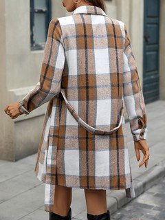 Back view of the tan plaid belted shirt dress, showing its silhouette and design details.