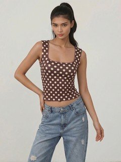 Lifestyle front view of the brown polka-dot square-neck tank top, showing its silhouette and design details.