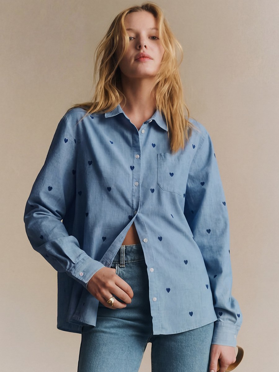 Blue Polka-Dot Twist-Front Shirt – Front View Front view of the blue polka-dot twist-front shirt, showing its silhouette and design details.