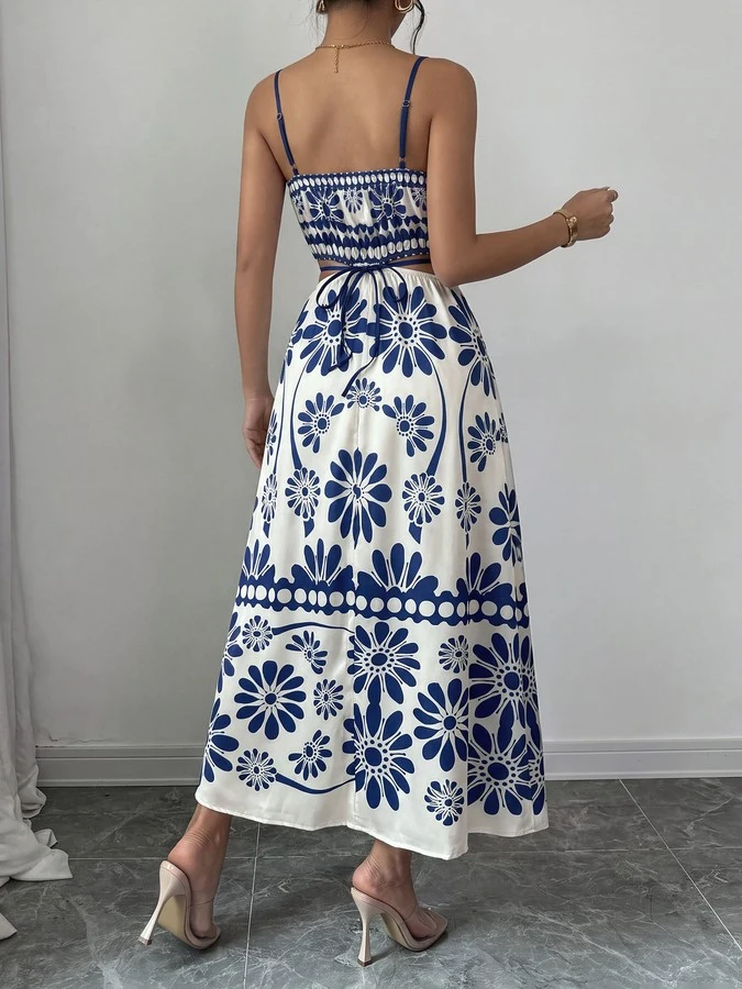 Back view of the blue porcelain floral-print spaghetti-strap maxi dress, showing the silhouette and fit.