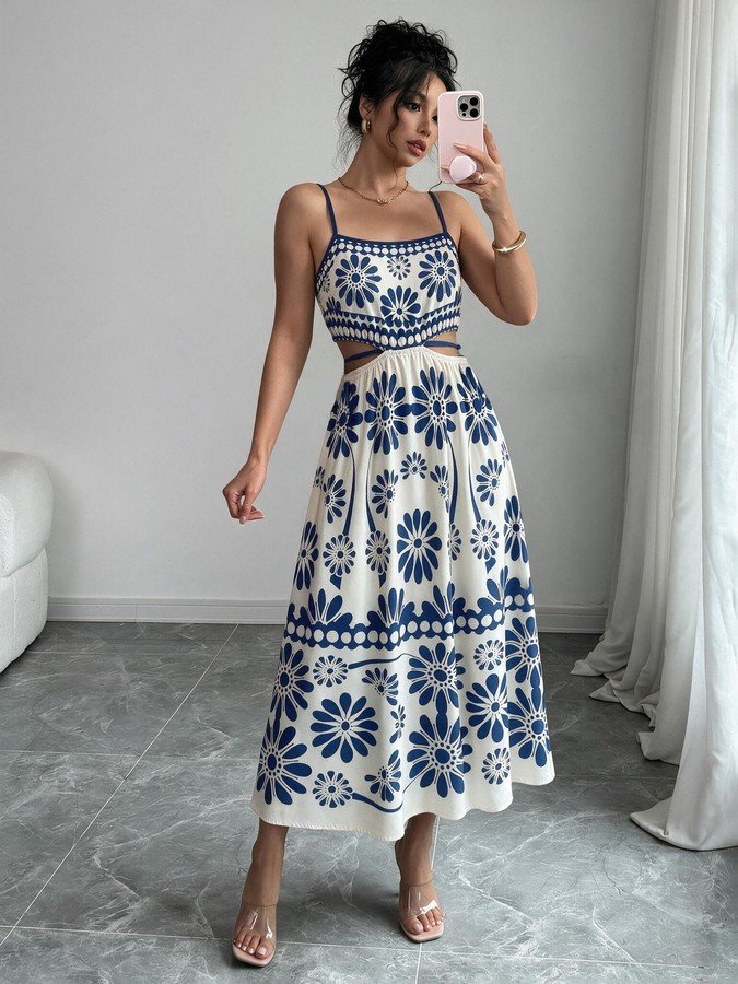Front view of the blue porcelain floral-print spaghetti-strap maxi dress, showing the silhouette and fit.